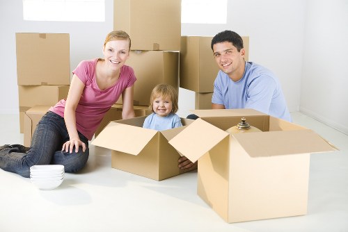 Removal team loading household items for a move in Watford