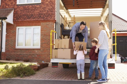 Watford moving service handling furniture on a residential street