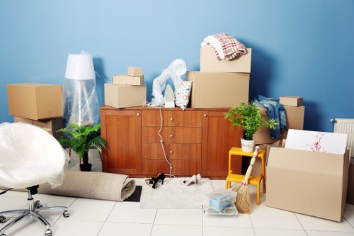 Boxes and furniture prepared for a Watford moving service
