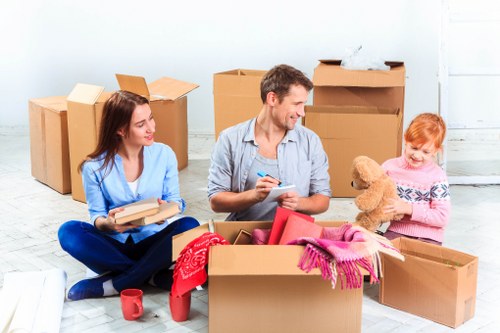 Commercial movers relocating office equipment in Watford