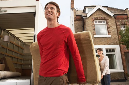 Furniture being loaded for a home move in Watford near local housing