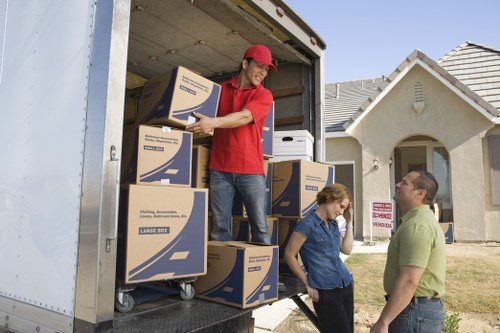 Local team loading furniture into a removal van