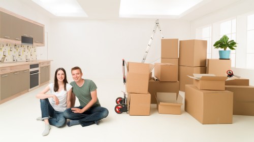 Packed moving boxes and household items ready for transport