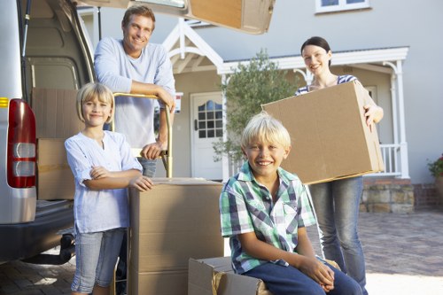 Packed boxes and furniture ready for a Watford house removal