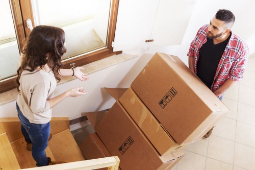 Office equipment and furniture being handled during a Watford relocation