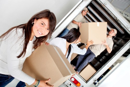 Packed office equipment ready for transport during a Watford relocation