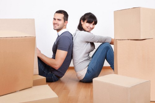 Removals vehicle loading household items in Watford